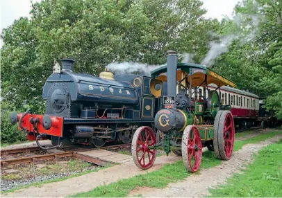  ??  ?? Left: Helston Railway general manager Colin Savage’s 1930 Richard Garrett & Co Type 4cd traction engine Lesley, the last one built, is an added attraction for visitors to the line when is steam. Lesley is seen alongside Peckett 0-4-0ST Kilmersdon during its loan period. HRPS