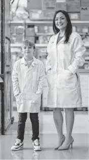  ?? Courtesy of FIU ?? Logan with FIU cancer researcher Diana Azzam, the leader of the clinical study in which he was enrolled. While it is rare for researcher­s to meet trial patients, a 2022 Live Like Bella symposium connected Azzam with Logan’s mother.