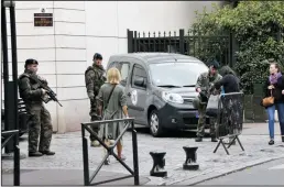  ?? ALAIN APAYDIN/ABACA PRESS ?? Police work near the scene where French soldiers were hit and injured by a vehicle in the western Paris suburb of Levallois-Perret near Paris on Wednesday.