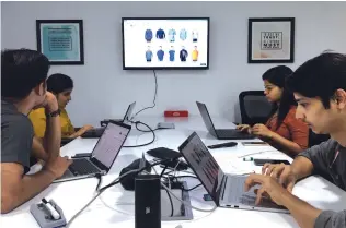  ??  ?? The GoFynd.io team at work in the company’s Mumbai office