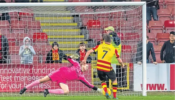  ??  ?? SAVING GRACES: Inverness keeper Mark Ridgers saves a penalty taken by Partick Thistle’s Blair Spittal in a game at Firhill