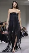  ?? RICHARD DREW, THE ASSOCIATED PRESS ?? Kendall Jenner closed the show in a glamorous strapless, black fringed dress with black sequin embroidery.