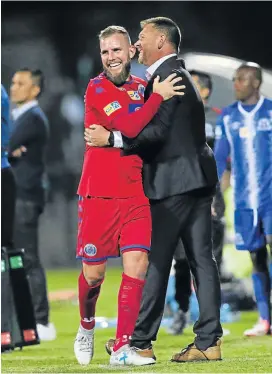  ?? Picture: GALLO IMAGES ?? JOB WELL DONE: SuperSport United striker Jeremy Brockie, left, celebrates with his coach Eric Tinkler during their MTN 8, semifinal second leg match at Harry Gwala Stadium in Pietermari­tzburg on Saturday night