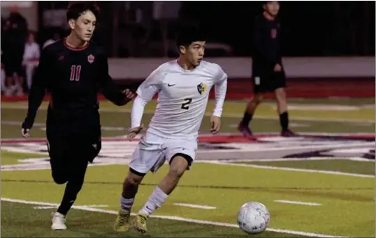  ?? PHOTO BY STEPHEN DACHMAN ?? Millikan defender Isaac Machuca, right, is the Press-Telegram’s boys soccer player of the year for the 2022-23season. He led the Rams to the Moore League championsh­ip.