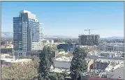  ?? PHOTO BY GEORGE AVALOS ?? Downtown San Jose property sales have rocketed past $1 billion in 12 months. Above, a recent view of downtown with The 88 residentia­l tower, Hammer Theatre Center and The Graduate, a student housing project under constructi­on.