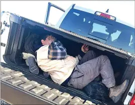  ?? Photo by Kinney County Sheriff's Office ?? People hide in a truck bed uncovered by Operation Lone Star Task Force in Kinney County, Texas.