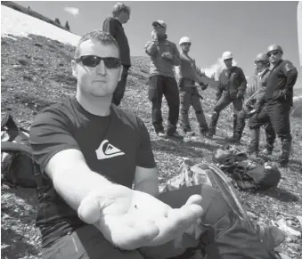  ?? KEITH MORISON FOR NATIONAL POST ?? Corporal Neal Carman shows a piece of the IED that wounded him during his Afghanista­n tour.