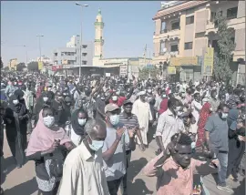  ?? MARWAN ALI — THE ASSOCIATED PRESS ?? People protest in Khartoum, Sudan, on Saturday. Pro-democracy protesters took to the streets across Sudan to rally against the military’s takeover last month.