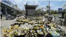  ??  ?? Authoritie­s sealed off a large floral tribute at the subway in Zhengzhou