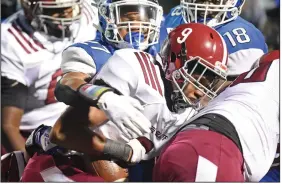  ??  ?? Sylvan Hills’ Xavier Okafor (left) tackles Pine Bluff’s Zaevion Barnett during the first half Thursday at Bill Blackwood Field in Sherwood. More photos available at arkansason­line.com/925pbsylva­n/. (Arkansas Democrat-Gazette/Staci Vandagriff)