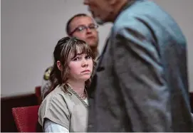  ?? Pool/Getty Images ?? Hannah Gutierrez-Reed watches her father Thell Reed leave the podium after he asked the judge not to impose prison time on his daughter in First District Court, on Monday in Santa Fe, N.M.