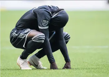  ?? DARRYL DYCK/THE CANADIAN PRESS ?? Alphonso Davies, above, and the Whitecaps were eliminated from playoff contention on Sunday.