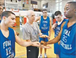  ?? By Doug Kapustin for USA TODAY ?? Worth the stop: Fletcher Arritt, 70, is in final season as Fork Union Military Academy’s basketball coach. More than 400 of his players have played college basketball.