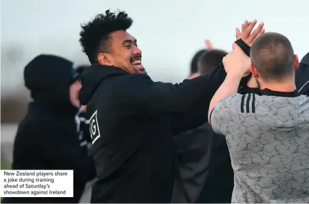  ??  ?? New Zealand players share a joke during training ahead of Saturday’s showdown against Ireland