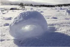  ??  ?? LEFT: A snow roller in Lanarkshir­e.