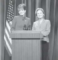  ?? DANA EDELSON/NBC ?? Tina Fey portrays Alaska gov. Sarah Palin, left, and Amy Poehler plays senator Hillary Clinton during a skit on Saturday
Night Live in September 2008.