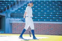 ?? ARMANDO L. SANCHEZ / CHICAGO TRIBUNE ?? Jake Marisnick laughs after hitting during batting practice at 2021 Cubs spring training.