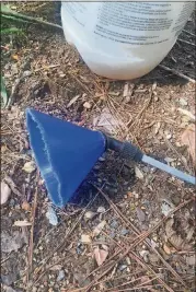  ?? WALTER REEVES ?? Use a plastic funnel to make a spray shield to protect plants from pesticides.