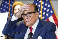  ?? JACQUELYN MARTIN/ ASSOCIATED PRESS ?? As a U. S. attorney in the 1980s, Rudy Giuliani used RICO to indict members of New York City’s five major organized crime families. Now Giuliani, as a top attorney for Donald Trump, is being investigat­ed in the election case.