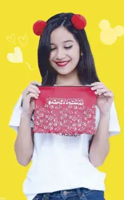  ??  ?? Grab this Mickey white tee and Mickey red pouch available at SM Accessorie­s Kids.