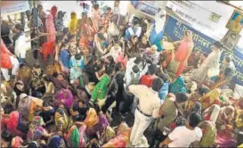  ?? HT ?? Narmada Bachao Andolan activist Medha Patkar and her supporters at the site of their hunger strike in Madhya Pradesh’s Dhar district before police forcibly moved them on Monday.