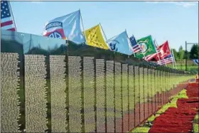  ?? DIGITAL FIRST MEDIA FILE PHOTO ?? “The Wall That Heals,” a replica of the the wall at the Vietnam Veterans Memorial in Washington, D.C., honoring the men and women who lost their lives in the Vietnam War, will be on display at Daniel Boone Area High School near Birdsboro.