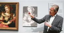  ?? Elizabeth Conley / Staff photograph­er ?? David Bomford talks about Michele Tosini’s “Saint Mary Magdalene” in front of an infrared image of the painting during the 2018 exhibition “Hidden Layers.”