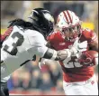  ?? MORRY GASH/AP ?? Wisconsin’s Jonathan Taylor ran for 200-plus yards for the 12th time in his college career Saturday.