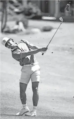  ?? TAYA GRAY/THE DESERT SUN ?? Charlie Reiter of Palm Desert hits from the 9th fairway at the U.S. Open golf qualifying at Bermuda Dunes Country Club in Bermuda Dunes on Thursday.