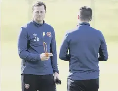  ??  ?? 0 Daly oversees training ahead of the weekend trip to Fir Park.