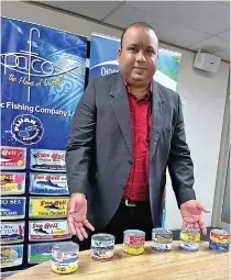  ?? ?? PAFCO chief executive officer, Saiyad Raiyum with the all the Quality Canned Tuna Products.