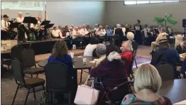  ?? Ryan Mancini/The Signal ?? The Silvertone Singers present a show at Bella Vida senior center on Friday. The show was dubbed “A Trip to the Zoo,” and featured animal-related songs.