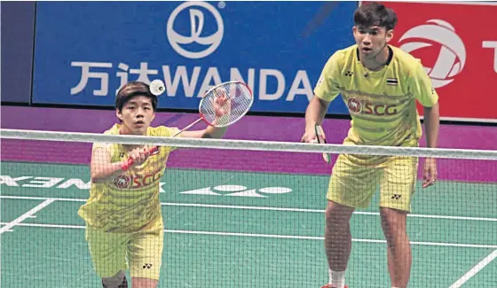  ??  ?? Sapsiree Taerattana­chai, left, and her mixed doubles partner Dechapol Puavaranuk­roh.