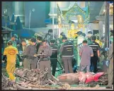  ??  ?? Police investigat­e the scene of a blast at the Erawan Shrine in Bangkok in 2015 Photograph: Dario Pignatelli/Getty