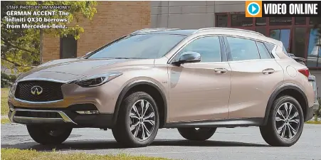  ?? STAFF PHOTO BY JIM MAHONEY ?? GERMAN ACCENT: The Infiniti QX30 borrows from Mercedes-Benz.