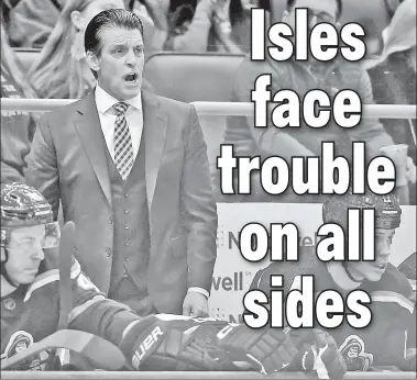  ?? USA TODAY Sports ?? KNIVES OUT: Head coach Lane Lambert and the Islanders face an ever-growing number of threats in the standings to their tenuous postseason pursuit.