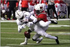  ?? RICK SCUTERI — THE ASSOCIATED PRESS ?? Ball State cornerback Antonio Phillips defends the pass intended for San Jose State wide receiver Jermaine Braddock (13) in the first half of the Arizona Bowl on Thursday in Tucson, Ariz.