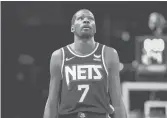  ?? JESSIE ALCHEH/AP ?? Forward Kevin Durant is among 10 Nets players in the NBA’S health and safety protocols amid a COVID-19 surge around the league.