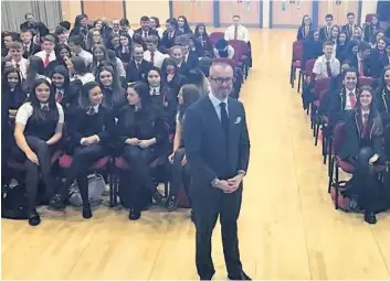  ??  ?? Informativ­e Lord Purvis (front) gave a talk to modern studies pupils before answering their questions