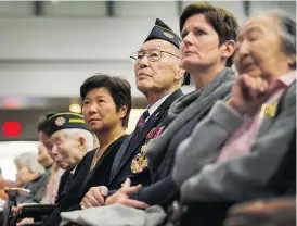  ?? ARLEN REDEKOP/PNG ?? Second World War veteran Ronald Lee, 99, listens to an apology to the Chinese community at the Chinese Cultural Centre on Sunday.