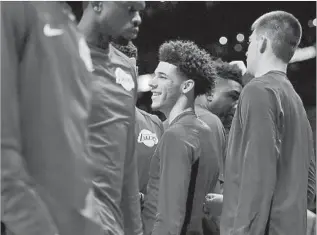  ?? Harry How Getty Images ?? ROOKIE LONZO BALL sat out the Lakers’ last four preseason games because of an ankle injury but says of Thursday’s regular-season opener against the Clippers, “I’m playing for sure.”