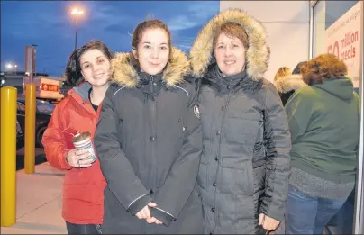  ?? GREG MCNEIL/CAPE BRETON POST ?? Selina Abousamara, Sarah MacKinnon and Amber MacKinnon were first in line for the Pet Smart Black Friday sale in Sydney.