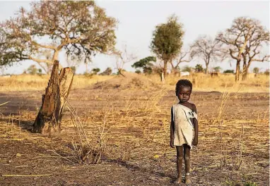  ?? PICTURE: UNICEF VIA AP ?? FACE OF HUNGER: A file image from March last year taken outside Udhaba, in South Sudan. The world’s largest humanitari­an crisis in 70 years has been declared there and in two other African countries close to famine.