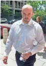  ?? ASSOCIATED PRESS ?? Former Blackwater guard Nicholas Slatten leaves federal court in Washington in 2014. A federal appeals court on Friday overturned his first-degree murder conviction.