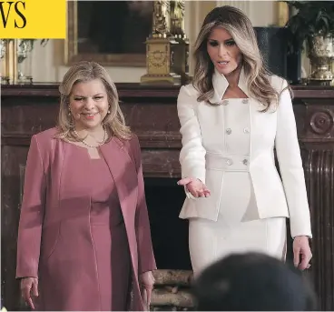  ?? ALEX WONG/GETTY IMAGES ?? Sara Netanyahu, left, wife of Israeli Prime Minister Benjamin Netanyahu, and Melania Trump, wife of U.S. President Donald Trump, arrive at the East Room of the White House before a joint news conference on Wednesday in Washington, D.C. The president...