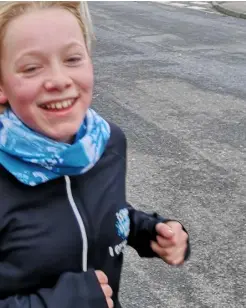  ??  ?? RUNNING: 11year-old Elodie Lewis has gone from couch to 10k to help raise funds for Cancer
Resarch UK. Instead of the £150 she’d hope to give, she has collected more than £1,000 in support