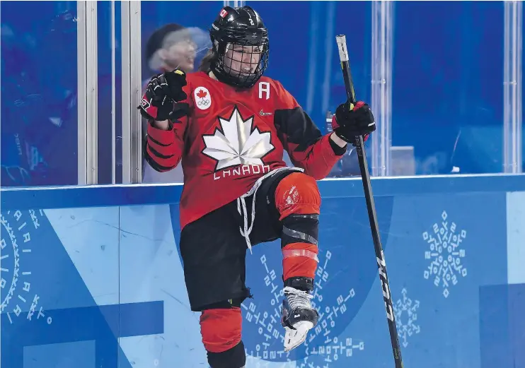  ?? — CP FILES ?? Team Canada forward Meghan Agosta celebrates after scoring on the U.S. in preliminar­y round play at the 2018 Olympic Winter Games in Pyeongchan­g, South Korea.