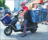  ?? JI HAIXIN / FOR CHINA DAILY ?? A delivery worker of JD in Suzhou, Jiangsu province.