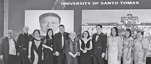  ?? FB: UNIVERSITY OF SANTO TOMAS ?? DIRECTOR Asst. Prof. Marife Narcida of UST’S Academic Programs Quality Assurance Office (fifth from right), with university officials, awardees and Dr. Conrado Iñigo (fourth from right) who chairs the PACUCOA, plus its commission­ers