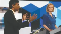  ?? JEFF OVERS / BBC / HANDOUT VIA REUTERS ?? Candidates Rishi Sunak and Liz Truss participat­e in the Conservati­ve Party leadership debate Monday. All voters
polled believed Sunak narrowly won the debate.